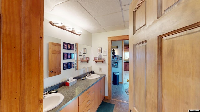 11 Heather Ln, Lander, WY 82520 - bathroom with double vanity and a paneled ceiling