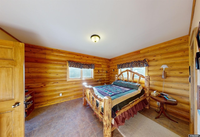 11 Heather Ln, Lander, WY 82520 - bedroom featuring multiple windows and log walls