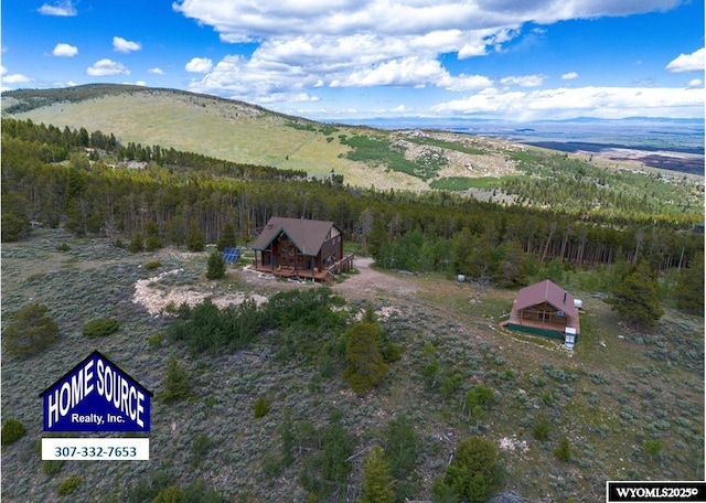 11 Heather Ln, Lander, WY 82520 - view of subject property with a heavily wooded area and mountains