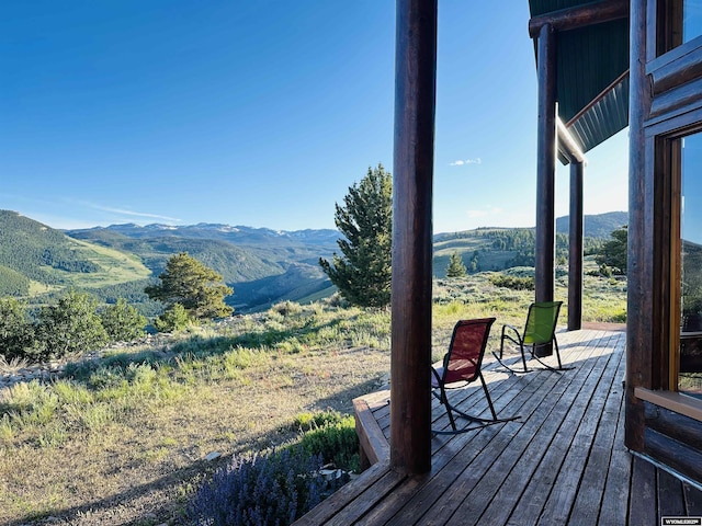 11 Heather Ln, Lander, WY 82520 - wooden deck featuring a mountain view