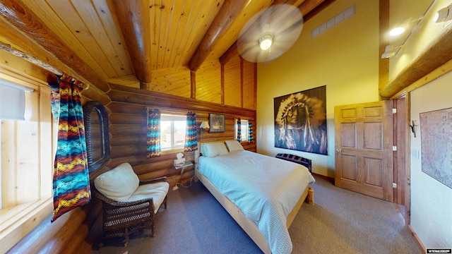 11 Heather Ln, Lander, WY 82520 - bedroom with log walls, carpet flooring, and wooden ceiling