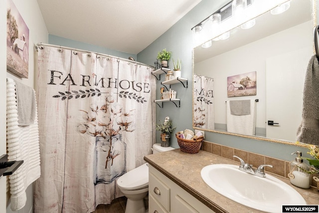 750 N Adams Ave, Buffalo, WY 82834 - full bathroom featuring vanity and curtained shower