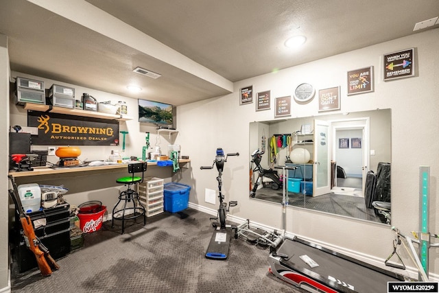 750 N Adams Ave, Buffalo, WY 82834 - exercise room with baseboards