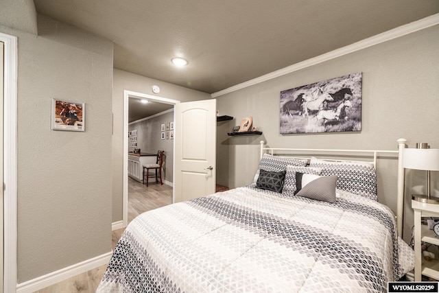 750 N Adams Ave, Buffalo, WY 82834 - bedroom with wood finished floors, crown molding, and recessed lighting