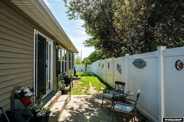 750 N Adams Ave, Buffalo, WY 82834 - fenced backyard with a patio