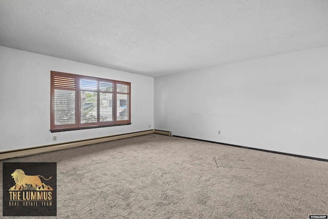 3710 Arroyo Dr, Casper, WY 82604 - carpeted empty room with a textured ceiling and a baseboard heating unit