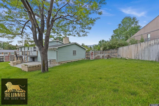 3710 Arroyo Dr, Casper, WY 82604 - fenced backyard featuring a deck