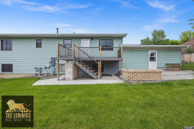 3710 Arroyo Dr, Casper, WY 82604 - back of property with a patio, stairs, a wooden deck, and a yard