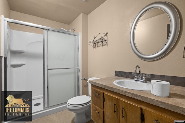 3710 Arroyo Dr, Casper, WY 82604 - full bathroom with vanity, a stall shower, and tile patterned floors