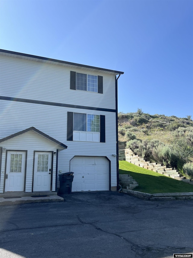 721 Sioux, Evanston, WY 82930 - view of front of property with a garage and driveway