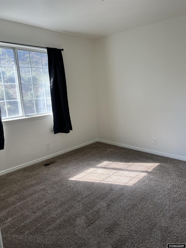 721 Sioux, Evanston, WY 82930 - spare room with carpet flooring
