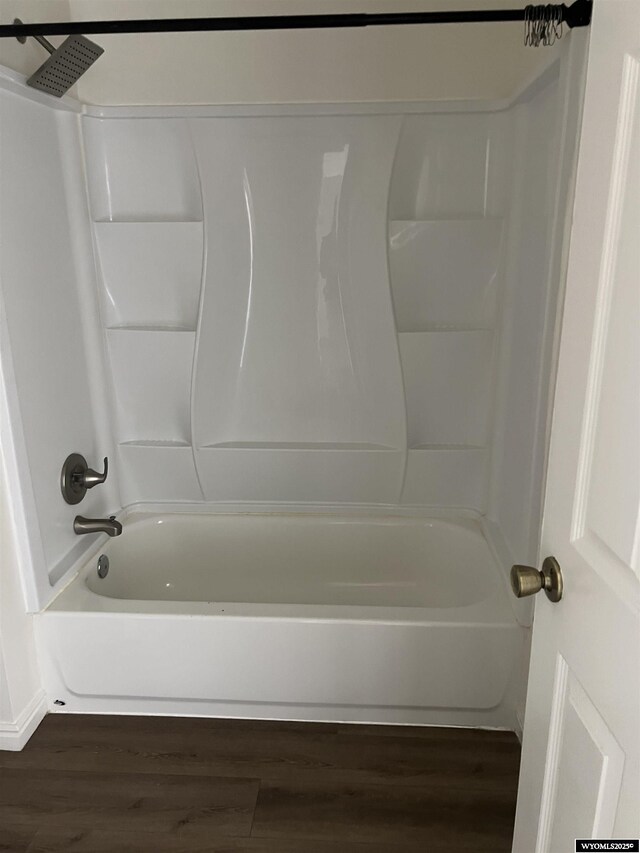 721 Sioux, Evanston, WY 82930 - full bath featuring wood finished floors and  shower combination
