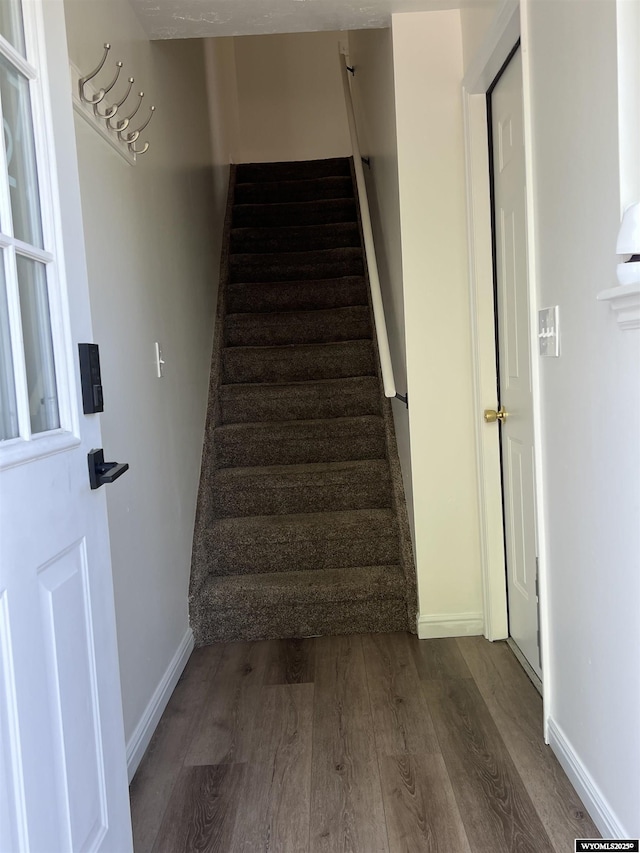721 Sioux, Evanston, WY 82930 - staircase with wood finished floors and baseboards