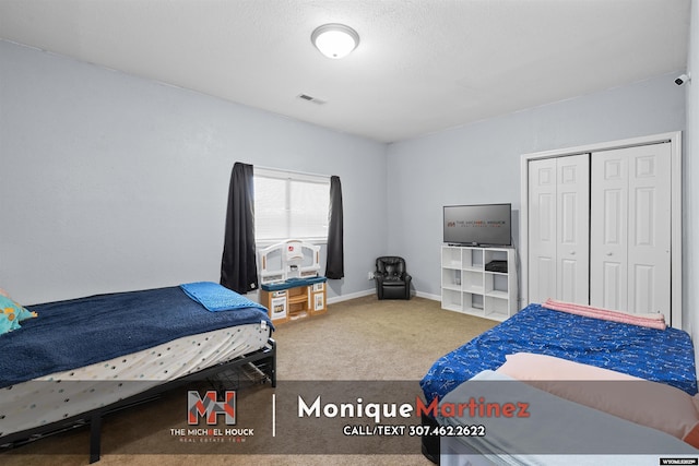 1043 Saint Mary St, Casper, WY 82601 - carpeted bedroom with a closet and baseboards