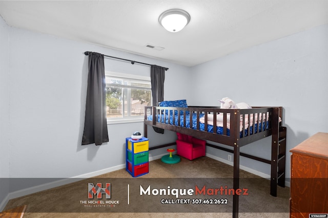 1043 Saint Mary St, Casper, WY 82601 - carpeted bedroom featuring baseboards