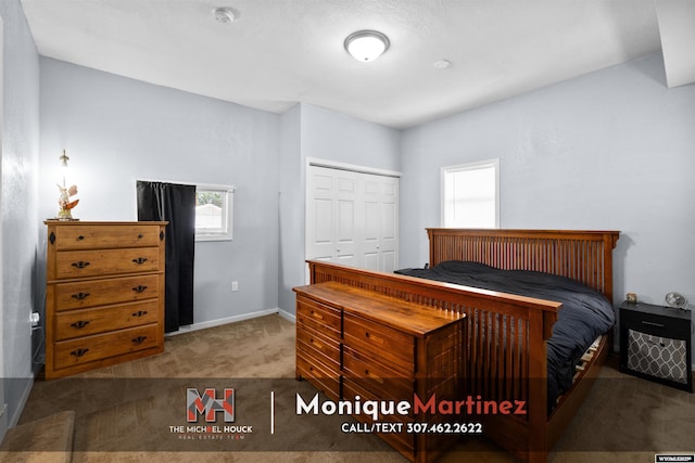 1043 Saint Mary St, Casper, WY 82601 - carpeted bedroom with a closet and baseboards