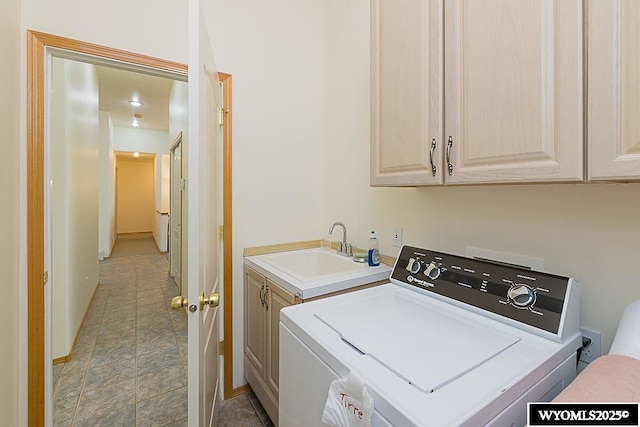 2215 Silver Creek Dr, Rock Springs, WY 82901 - washroom with cabinet space and separate washer and dryer