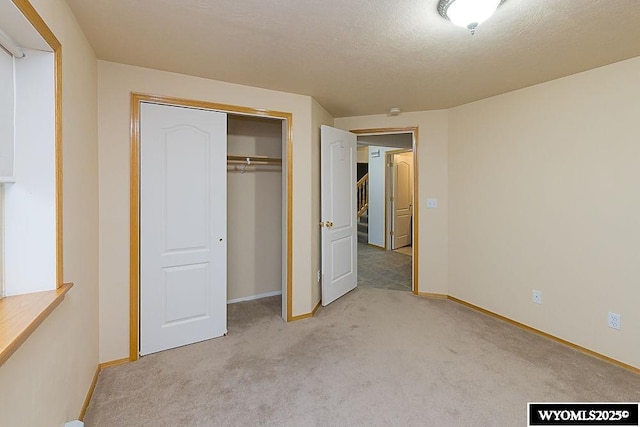 2215 Silver Creek Dr, Rock Springs, WY 82901 - unfurnished bedroom featuring light carpet and a closet