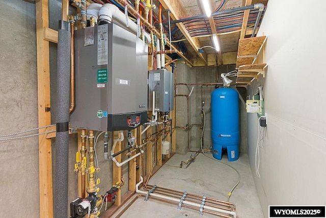 2215 Silver Creek Dr, Rock Springs, WY 82901 - utility room featuring tankless water heater