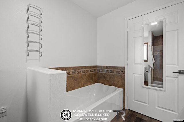 1728 James, Casper, WY 82601 - bathroom featuring a bath and wood finished floors