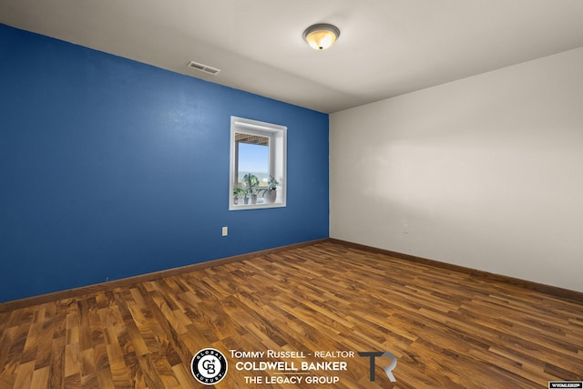 1728 James, Casper, WY 82601 - empty room with wood finished floors and baseboards