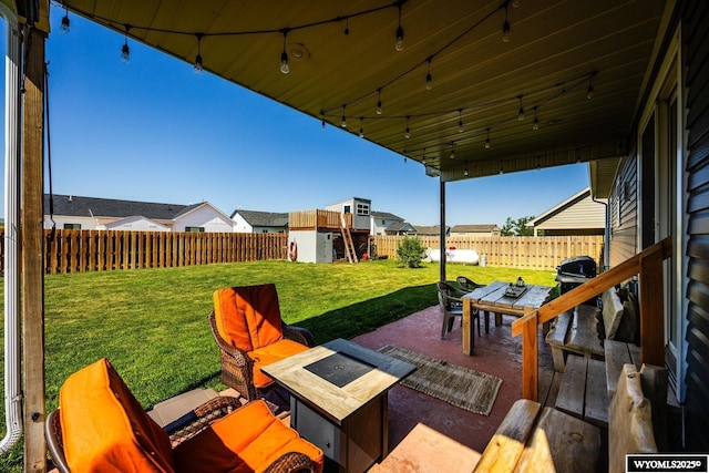 1343 Silverton Dr, Ranchester, WY 82839 - fenced backyard with a storage shed, a patio area, and outdoor dining area