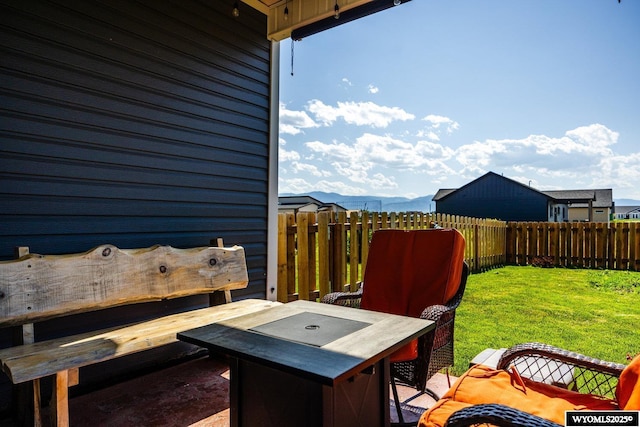 1343 Silverton Dr, Ranchester, WY 82839 - fenced backyard featuring a patio and outdoor dining area