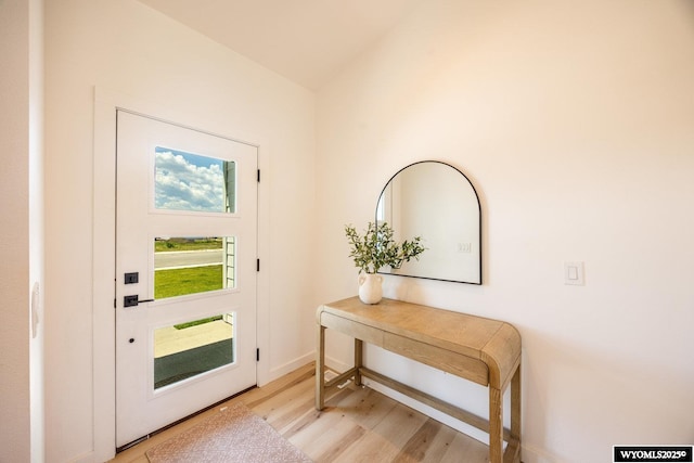 1429 Silverton Dr, Ranchester, WY 82839 - doorway featuring light wood-type flooring and baseboards