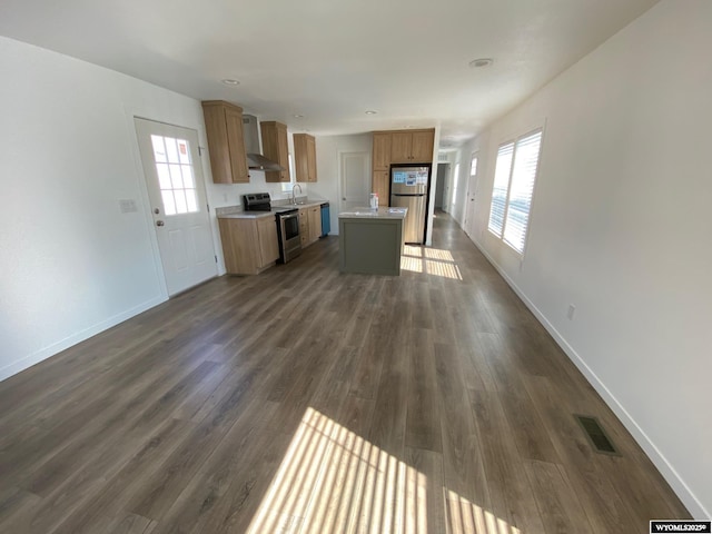 601 24th St Lot N31, Rawlins, WY 82301 - kitchen with stainless steel appliances, healthy amount of natural light, light countertops, and open floor plan