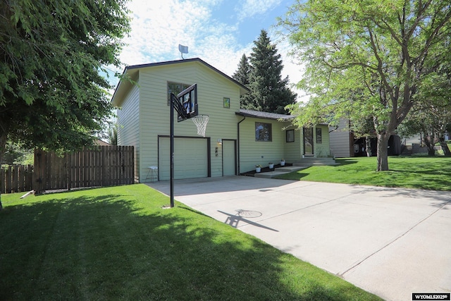 609 Klondike Dr, Buffalo, WY 82834 - view of front of property featuring a garage and driveway