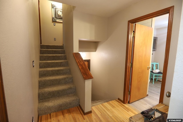 609 Klondike Dr, Buffalo, WY 82834 - stairway with hardwood / wood-style flooring