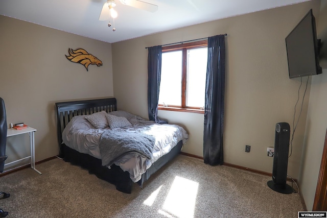 609 Klondike Dr, Buffalo, WY 82834 - carpeted bedroom with ceiling fan and baseboards