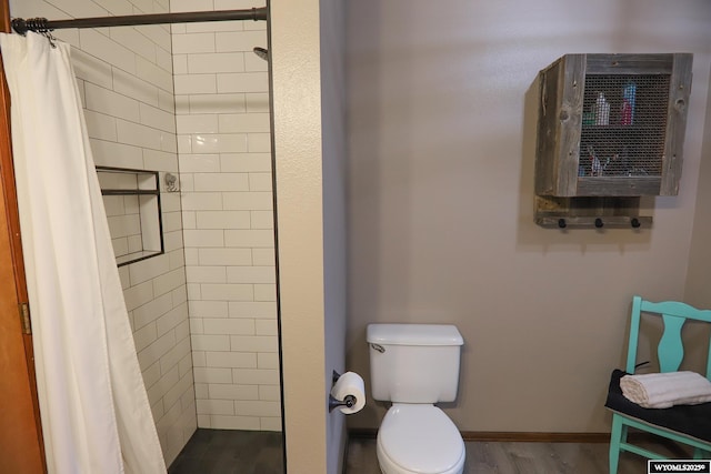 609 Klondike Dr, Buffalo, WY 82834 - bathroom featuring a shower stall and wood finished floors
