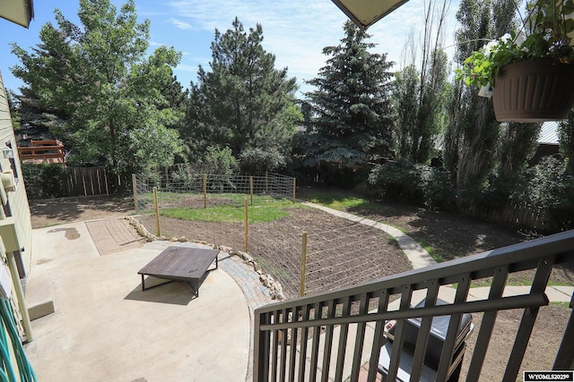 609 Klondike Dr, Buffalo, WY 82834 - fenced backyard featuring a patio area