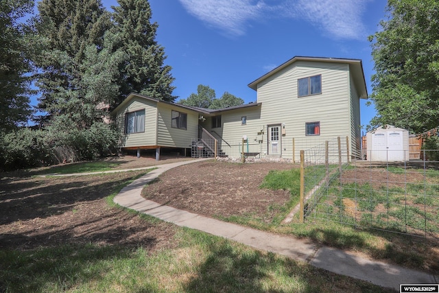 609 Klondike Dr, Buffalo, WY 82834 - back of house featuring a shed