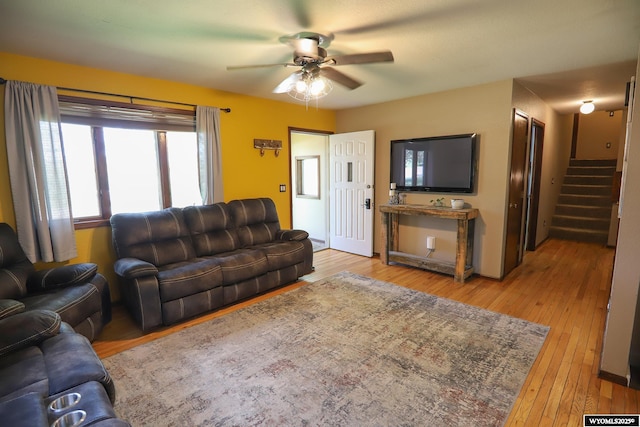 609 Klondike Dr, Buffalo, WY 82834 - living room with ceiling fan, stairs, and hardwood / wood-style flooring