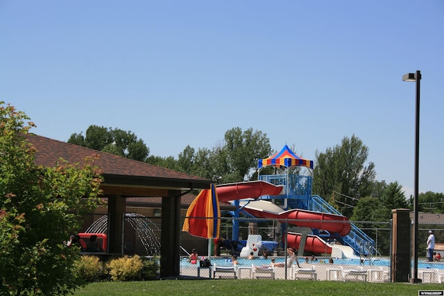 321 N Platte River Dr, Guernsey, WY 82214 - community playground featuring a community pool