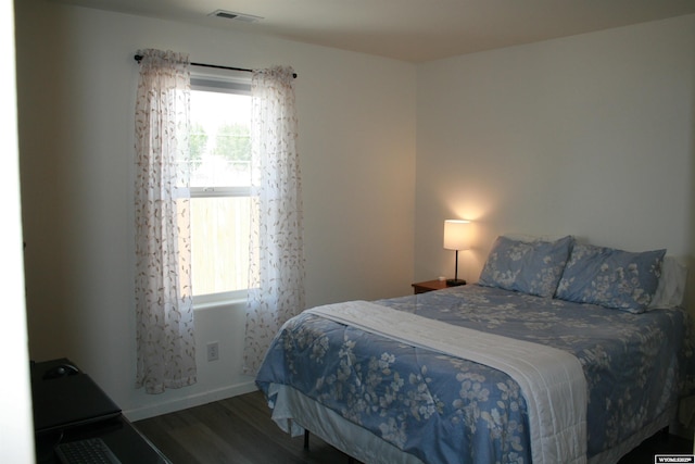 321 N Platte River Dr, Guernsey, WY 82214 - bedroom with wood finished floors and baseboards