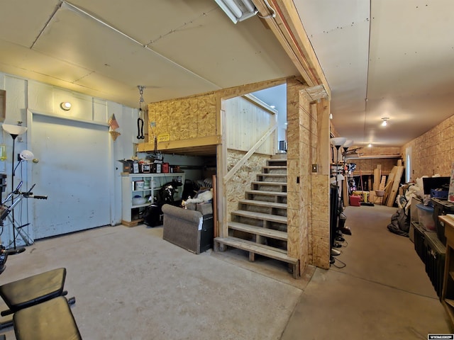 313 Cottonwood St, Evanston, WY 82930 - basement with stairway and a workshop area