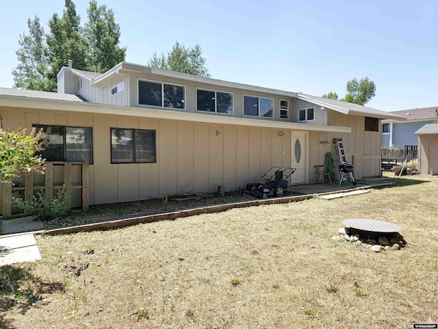 313 Cottonwood St, Evanston, WY 82930 - view of front of house with board and batten siding