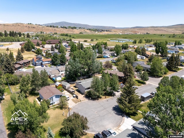 313 Cottonwood St, Evanston, WY 82930 - aerial view of residential area with a mountain backdrop