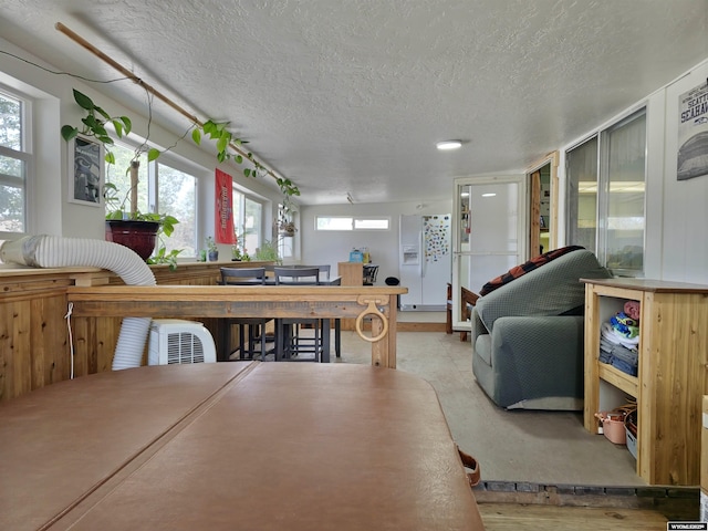 313 Cottonwood St, Evanston, WY 82930 - dining area featuring a textured ceiling