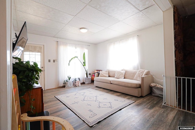 1435 Main St, Evanston, WY 82930 - living area featuring wood finished floors and a drop ceiling