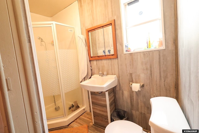 1435 Main St, Evanston, WY 82930 - bathroom with a shower stall and wood finished floors