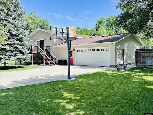 1542 Cloud Peak Dr, Worland, WY 82401 - view of front of property with a chimney and concrete driveway