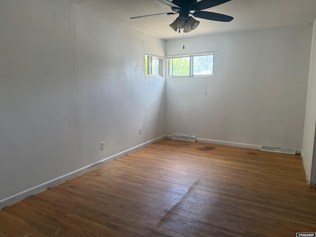 524 E Murray St, Rawlins, WY 82301 - empty room featuring a ceiling fan and wood finished floors