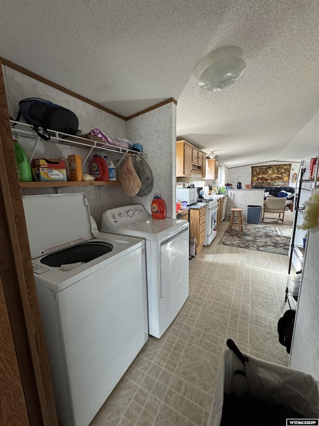 1700 Swanson # 89, Rock Springs, WY 82901 - washroom featuring washer and clothes dryer, a textured ceiling, and crown molding