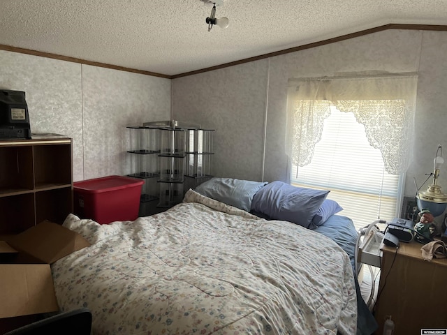 1700 Swanson # 89, Rock Springs, WY 82901 - bedroom featuring crown molding, a textured ceiling, and lofted ceiling