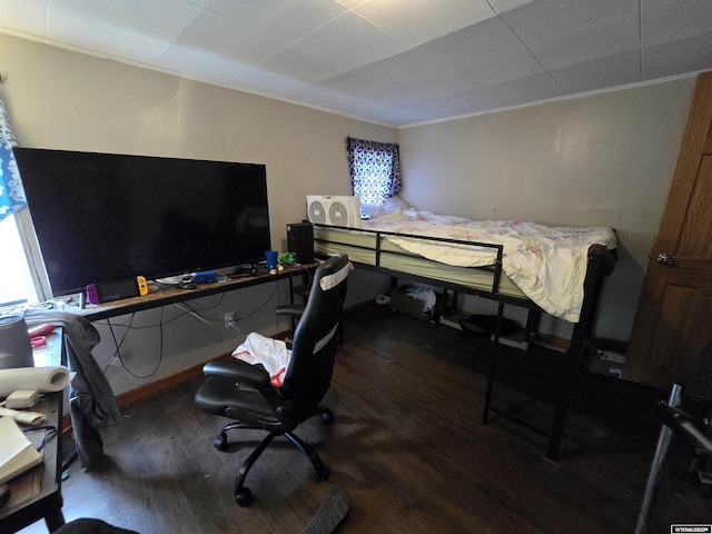 251 S Nebraska Ave, Guernsey, WY 82214 - bedroom with wood finished floors, crown molding, and an office area
