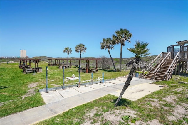 6317 State Highway 361 Unit 3311, Port Aransas, TX 78373 - view of home's community with a lawn and stairway